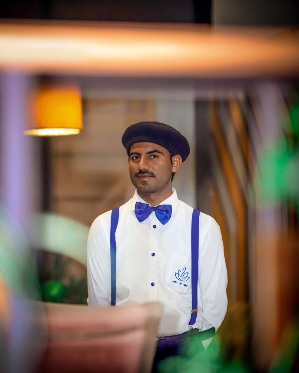 Portrait of Devon Highland, founder of In Your Face Hospitality.